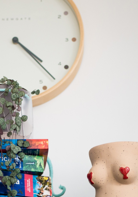 pot with clock in the background